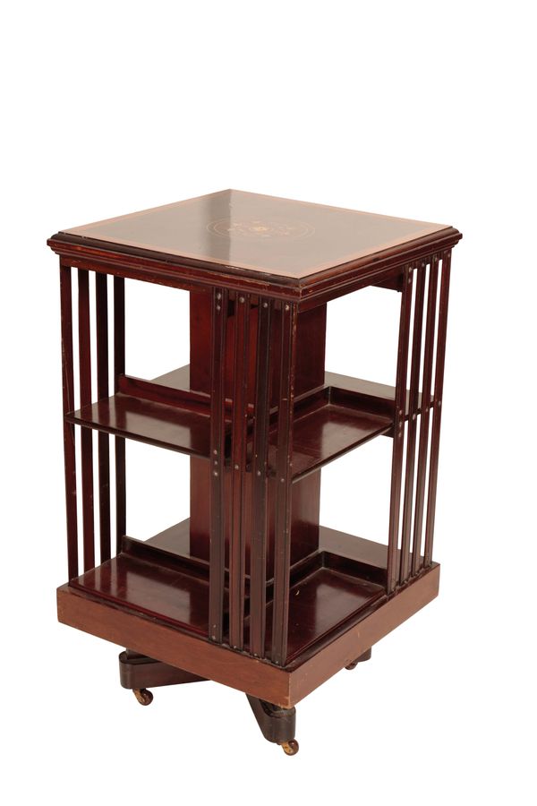 AN EDWARDIAN MAHOGANY REVOLVING BOOKCASE,