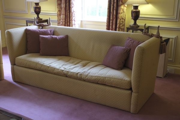 A PAIR OF KNOLE STYLE SOFAS