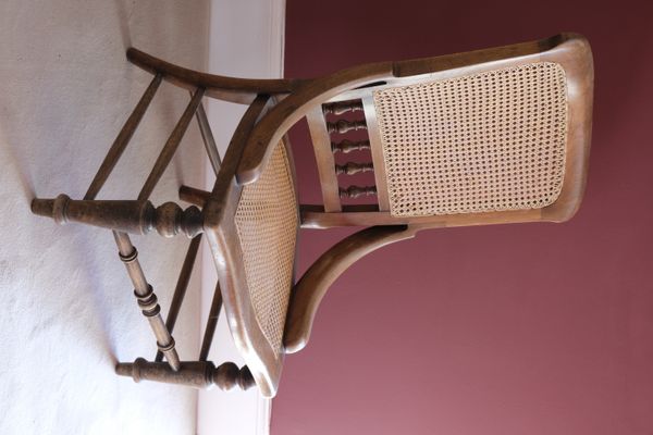 A VICTORIAN CANED NURSING CHAIR