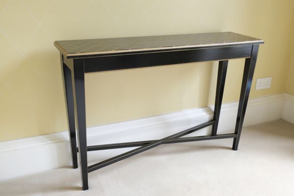 A PAIR OF BLACK AND GILT LACQUERED SIDE TABLES