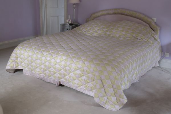 A LARGE DOUBLE BED