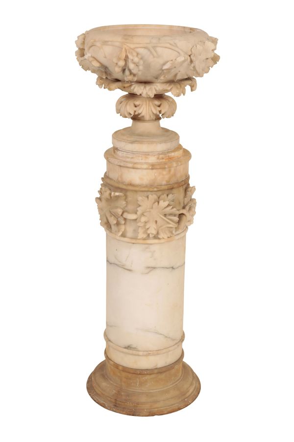 AN ITALIAN CARVED ALABASTER URN ON PLINTH,