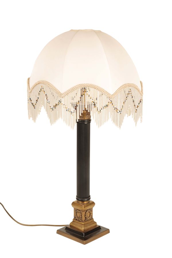 A GILT METAL TABLE LAMP IN BAROQUE STYLE,