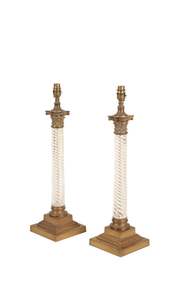 A PAIR OF MOULDED GLASS AND GILT METAL MOUNTED TABLE LAMPS,