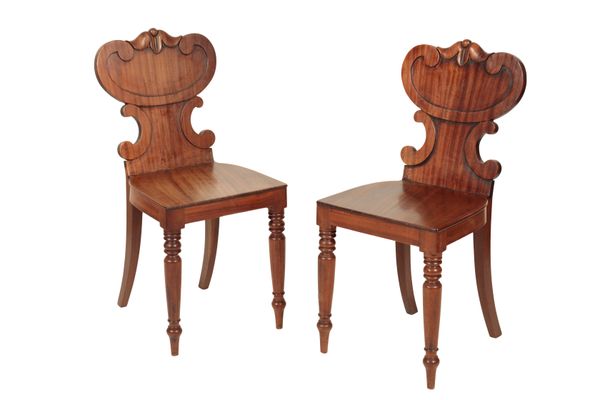 A PAIR OF REGENCY OR GEORGE IV MAHOGANY HALL CHAIRS,