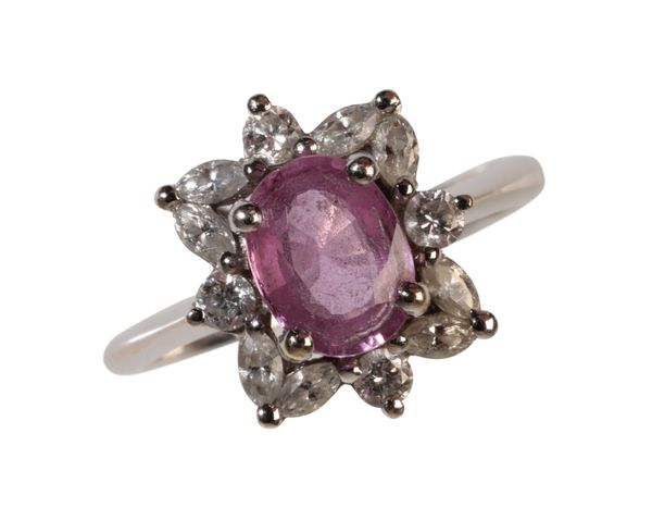 A PINK GEM STONE AND DIAMOND CLUSTER  RING