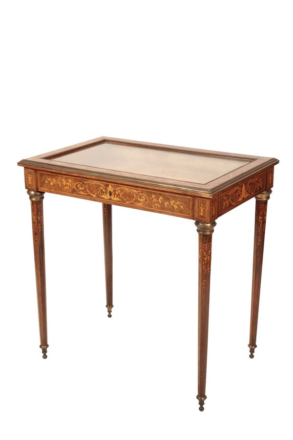 A FRENCH MARQUETRY, GILT METAL MOUNTED AND GLAZED BIJOUTERIE TABLE,