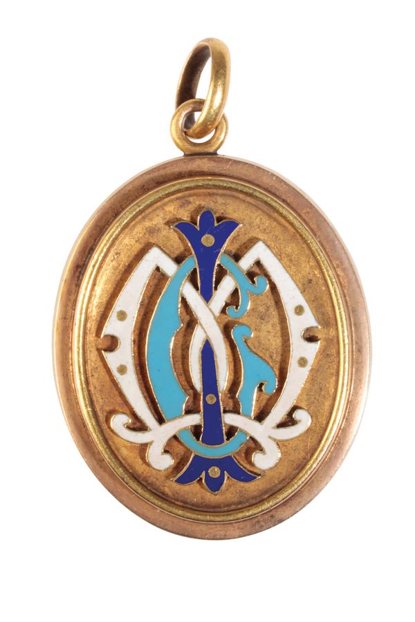 A VICTORIAN  GOLD AND ENAMEL LOCKET