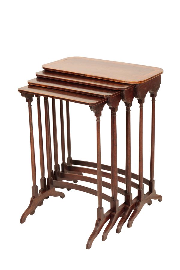A NEST OF FOUR ROSEWOOD AND CROSSBANDED QUARTETTO TABLES,