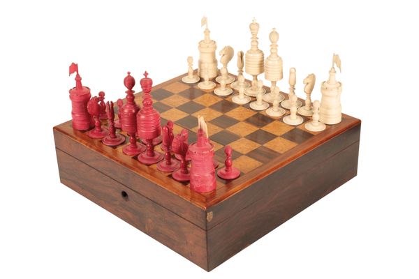 A TURNED, CARVED AND PART STAINED BONE BARLEYCORN PATTERN CHESS SET,