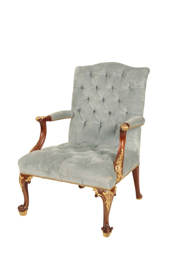 A CARVED AND PARCEL GILT WOOD AND UPHOLSTERED FAUTEUIL IN LOUIS XV STYLE,