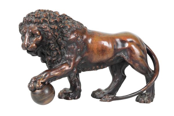 AFTER FERNANDO TACCA, A BRONZE MODEL OF ONE OF THE TWO MEDICI LIONS,