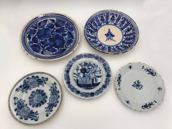 A DUTCH DELFTWARE BLUE AND WHITE PLATE