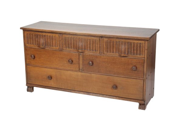 * NIGEL GRIFFITHS: A PAIR OF HANDMADE OAK LOW CHESTS OF DRAWERS