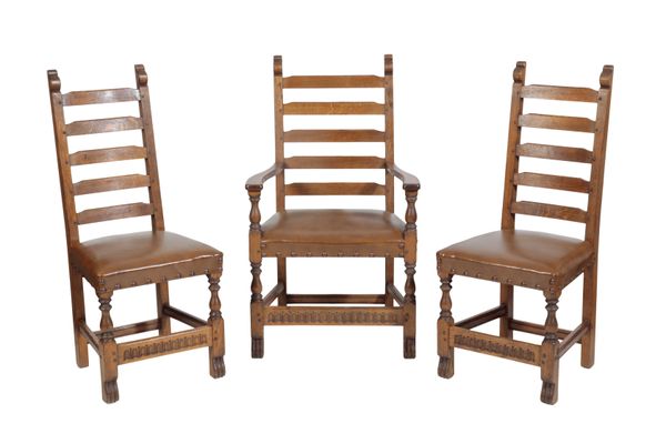 * NIGEL GRIFFITHS: A SET OF TWELVE HANDMADE LADDER BACK OAK DINING CHAIRS,