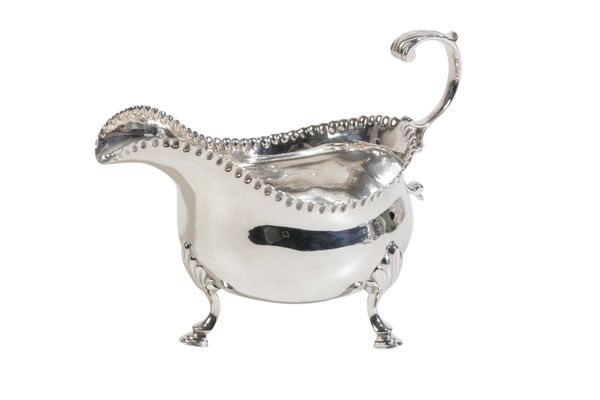 A GEORGE III SILVER SAUCE BOAT,