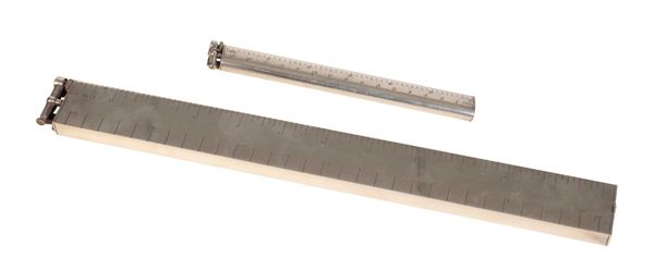 DUNHILL: A NOVELTY ELECTROPLATED LIGHTER IN THE FORM OF A 12" RULER