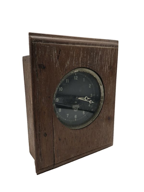 A SMITH'S AIRPLANE DASHBOARD CLOCK