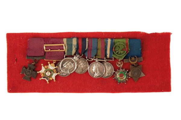 MOUNTED GROUP OF NINE MINIATURES AWARDED TO MAJOR GENERAL EUSTON HENRY SARTORIUS VC CB.