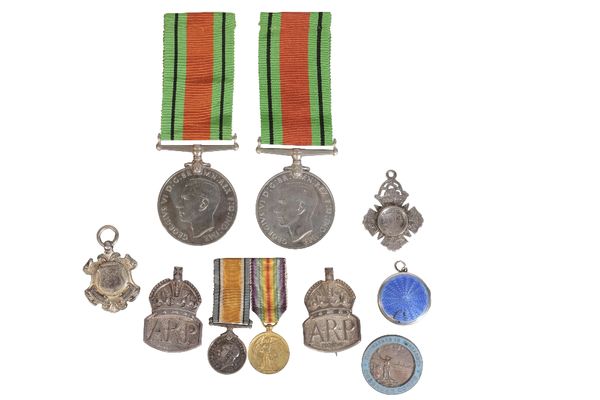 A HUSBAND AND WIFE WW2 ARP MEDAL GROUP