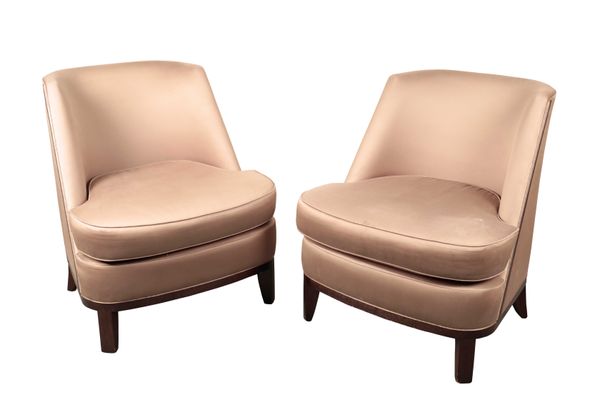 A PAIR OF CUSHIONED LOUNGE CHAIRS