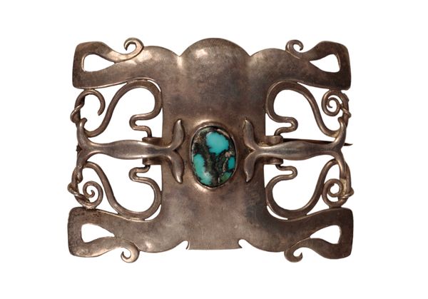 OLIVER BAKER FOR LIBERTY & CO: AN ART NOUVEAU SILVER AND MATRIX TURQUOISE STONE SET BUCKLE