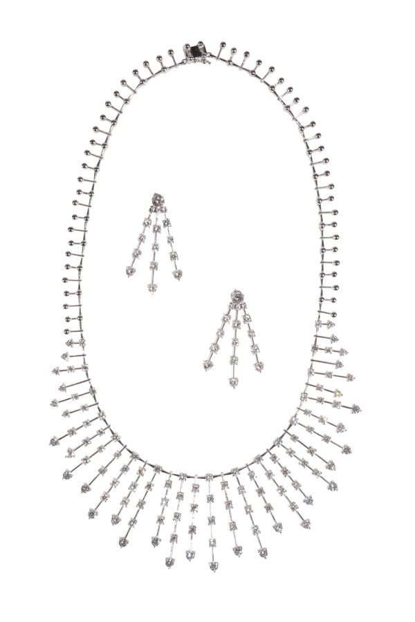 A MODERN DIAMOND AND WHITE GOLD NEGLIGEE NECKLACE WITH EN SUITE EARRINGS,