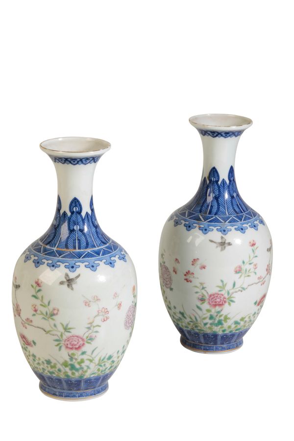 PAIR OF BLUE AND WHITE FAMILE ROSE VASES