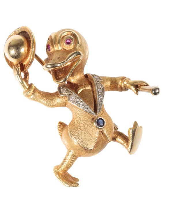 A GOLD AND DIAMOND DONALD DUCK BROOCH