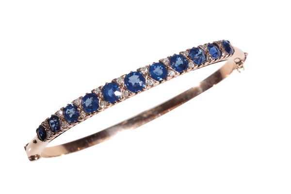 A SAPPHIRE AND DIAMOND BANGLE