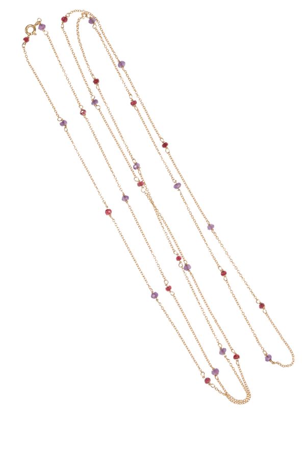 A LONG SPECTACLE CHAIN SET WITH AMETHYST AND RUBY