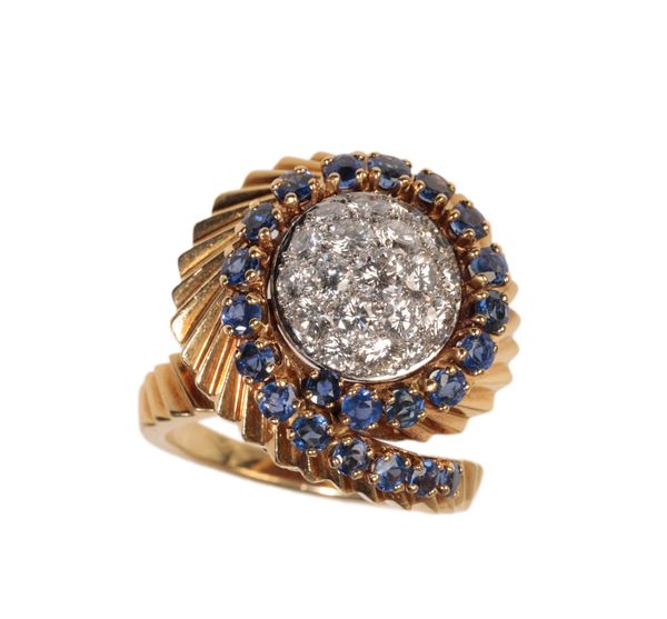 A LATE 1950S FRENCH SAPPHIRE AND DIAMOND SWIRL RING