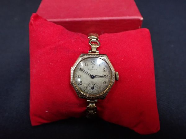 ROLEX: A LADY'S 9CT GOLD WRISTWATCH