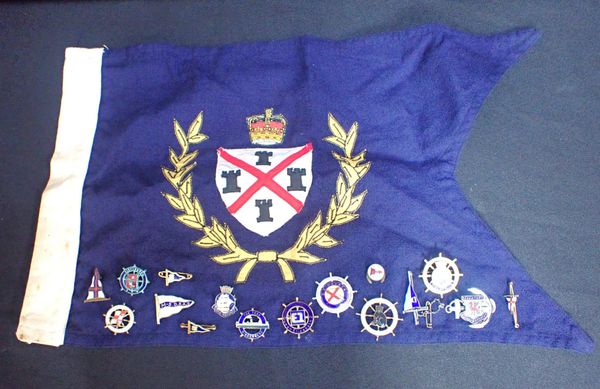 A COLLECTION OF YACHTING RELATED BADGES