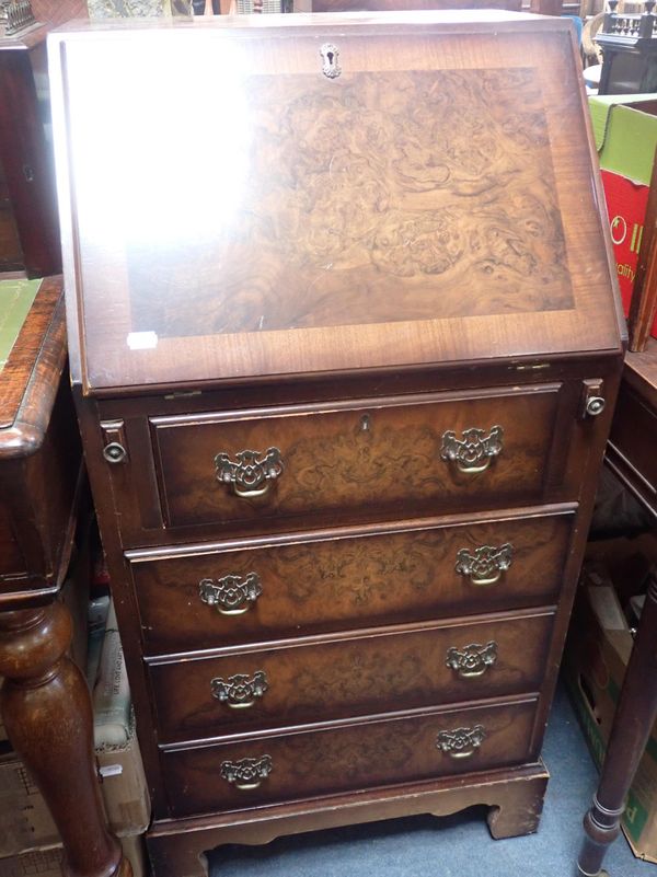 A SMALL WALNUT BUREAU