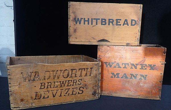 THREE VINTAGE WOODEN BEER CRATES