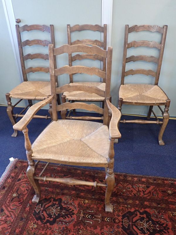 A PART SET OF FOUR OAK LADDERBACK CHAIRS