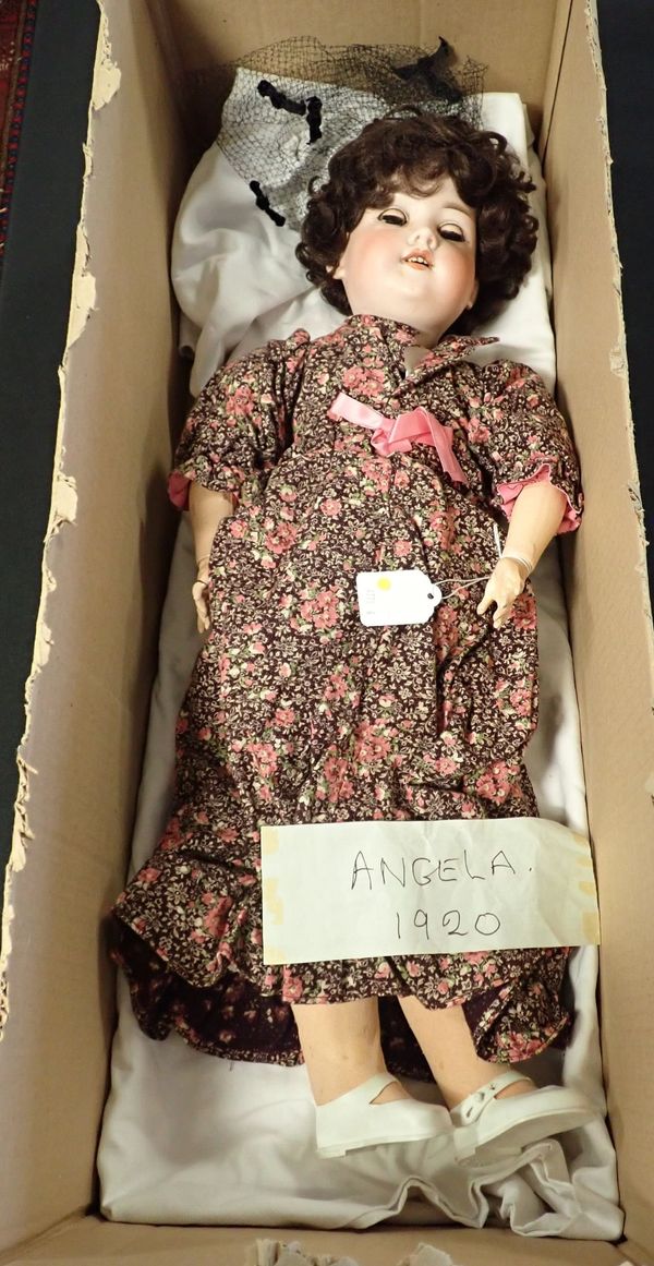 AN ARMAND MARSEILLES BISQUE HEAD DOLL