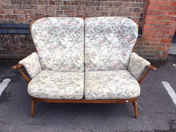 AN ERCOL WINDSOR TWO SEATER SOFA