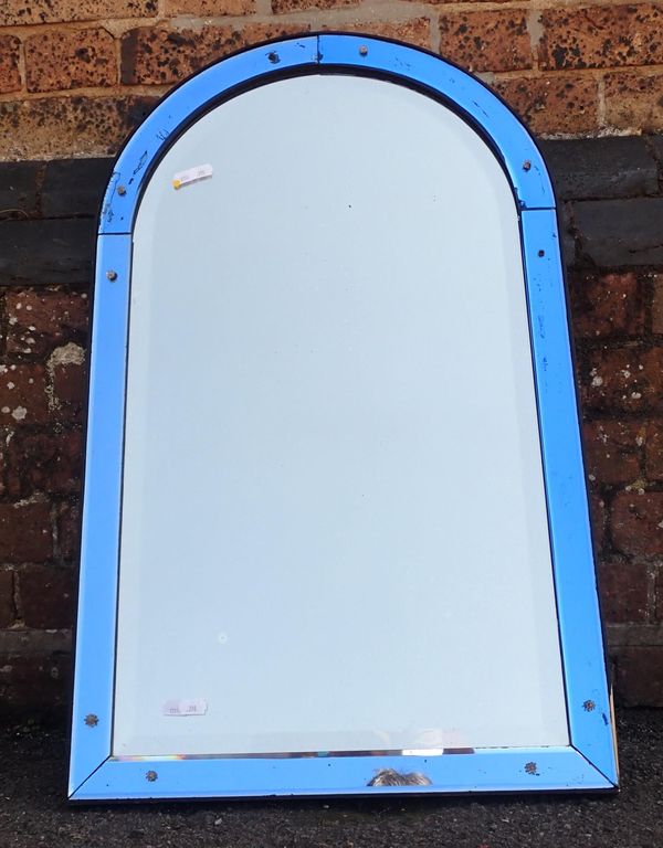 AN ART DECO ARCHED MIRROR WITH BLUE MIRRORED MARGINS