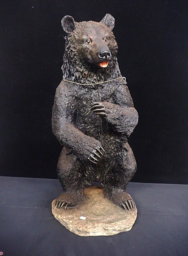 A LARGE RESIN CAST BLACK BEAR