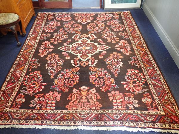 A SHIRAZ RUG WITH CENTRAL MOTIF