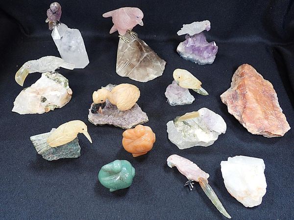 A COLLECTION OF CARVED MINERAL BIRDS