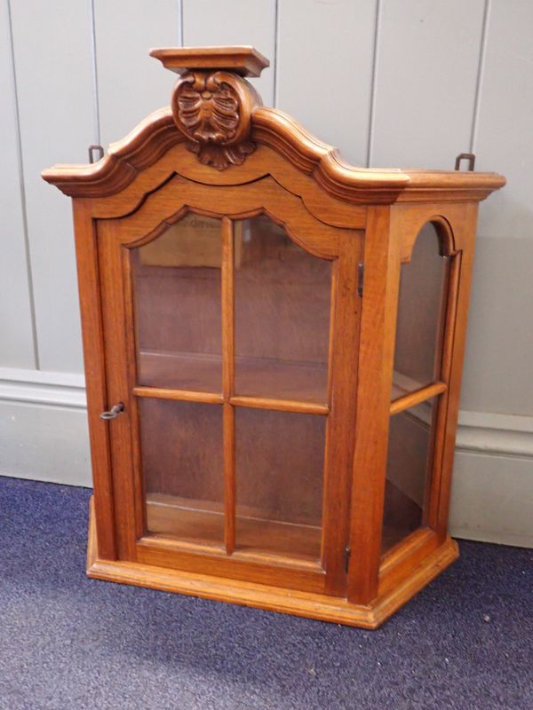 A SMALL DUTCH OAK WALL HANGING CABINET