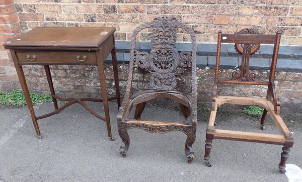 AN ANGLO-INDIAN CARVED SLIPPER CHAIR FRAME