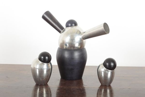 *ELEANOR KEARNEY: A CONTEMPORARY PEWTER TEAPOT AND CANISTERS