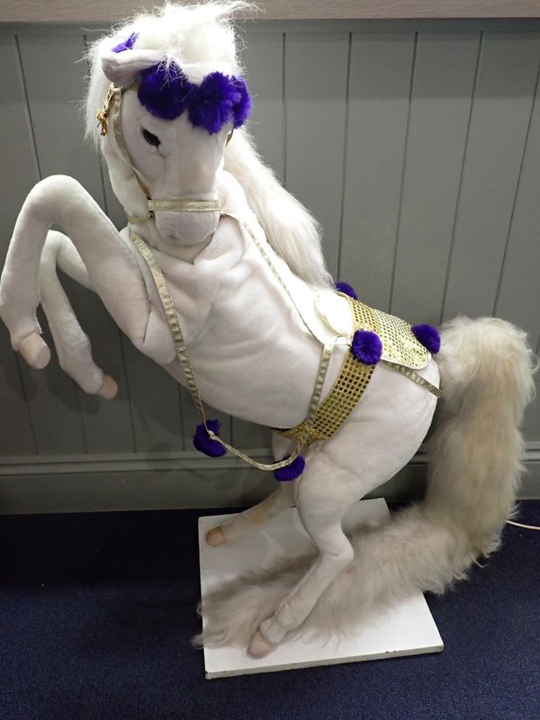 A MODERN SHOP DISPLAY WHITE HORSE AUTOMATON