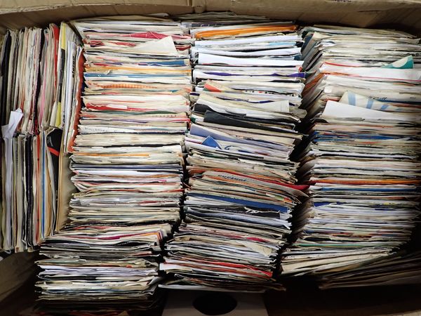 A LARGE QUANTITY OF 45 RPM SINGLE RECORDS