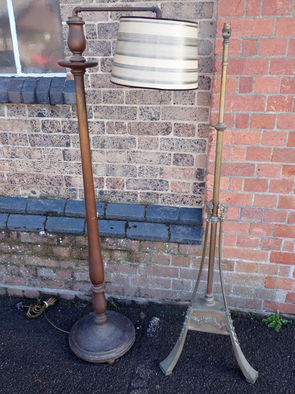 AN EDWARDIAN BRASS STANDARD LAMP