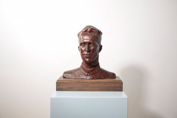 *ERIC HENRI KENNINGTON (1888-1960) Portrait bust of T. E. Lawrence